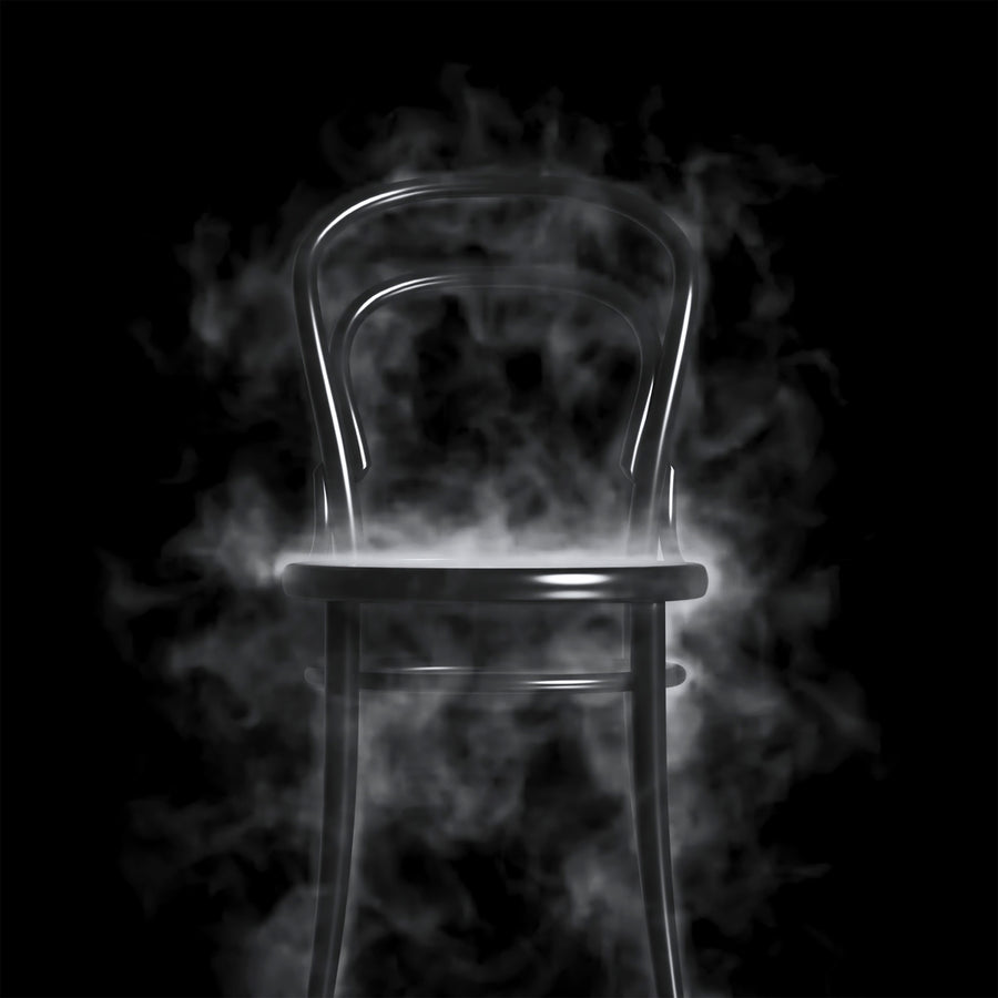 Chair 14 - Cane with classic bent beech wood design surrounded by smoke on a black background.