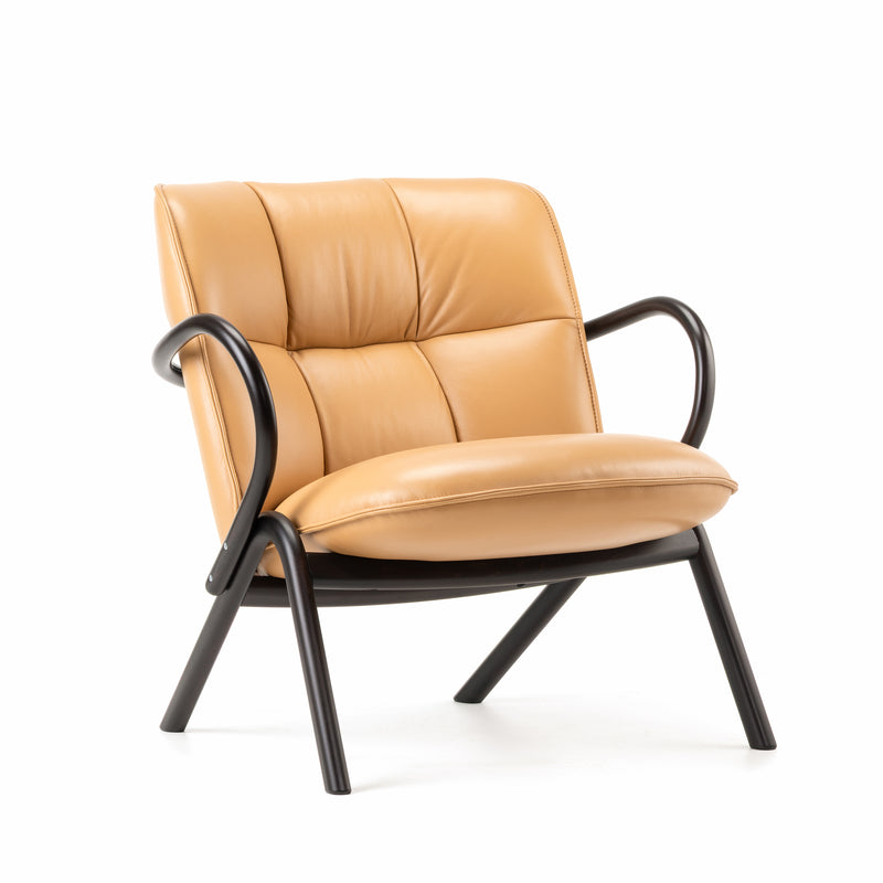 Cissy Lounge Chair Low-Back with soft tan upholstery and bentwood black frame, designed for comfort and style.