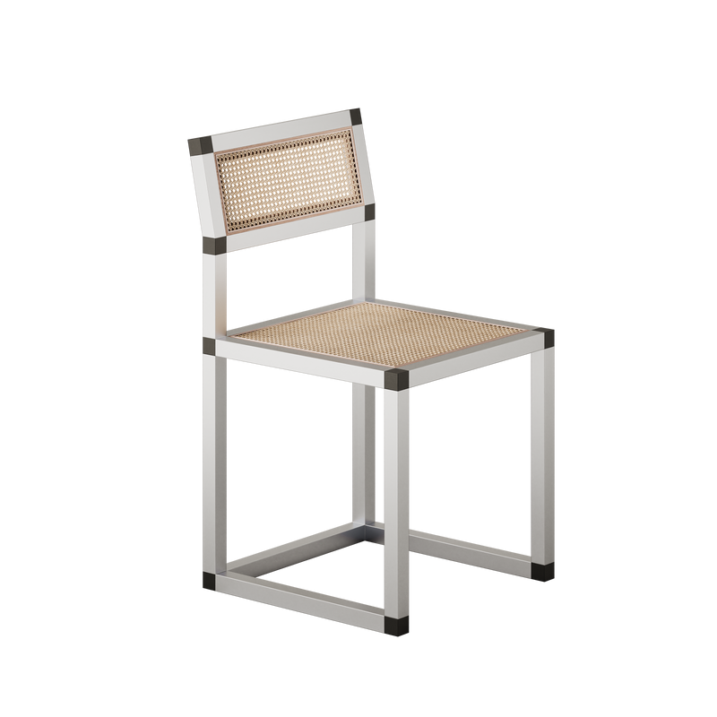 XD Chair Cane with aluminum frame and cane seat and backrest, combining modern design with classic elegance.