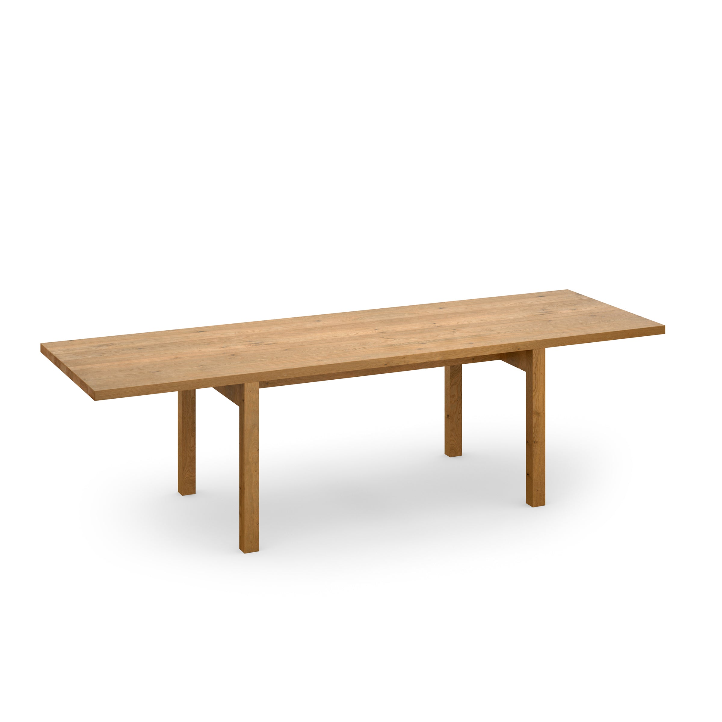 The E15 DC09 Galerie table by David Chipperfield has a minimalist design with a long, solid oak rectangular surface and four straight legs that highlight the wood grain against a white background.