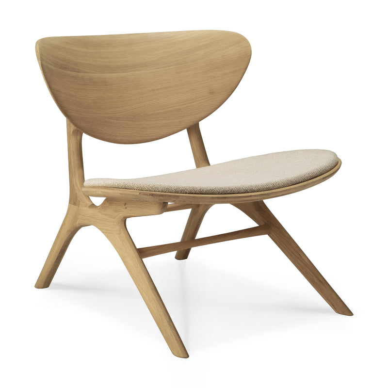 Eye Lounge Chair by Ethnicraft with curved wooden backrest and beige cushioned seat in sleek modern design.