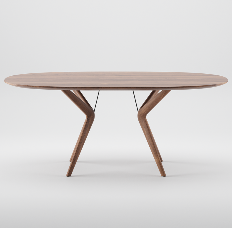 The Artisan LAKRI Oval Table features a smooth, oval top with two uniquely angled, V-shaped legs made from solid wood. Its modern, minimalist design exudes elegance through its luxurious wood texture, beautifully showcased against a plain white background.