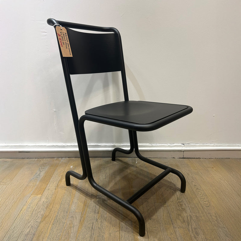 László Chair - Sale featuring a black cantilever steel frame with plywood seat and backrest in matte finish.