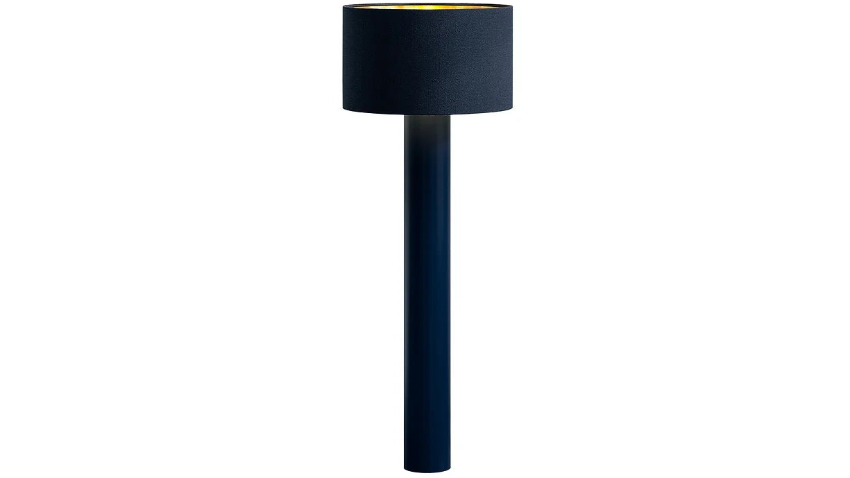 The ALL ROUND Floor Lamp by Victor Foxtrot is a tall, slim black lamp with a cylindrical shade and straight stand on a white background. Its dark wool-like fabric shade enhances its sleek, modern design while providing warm light.