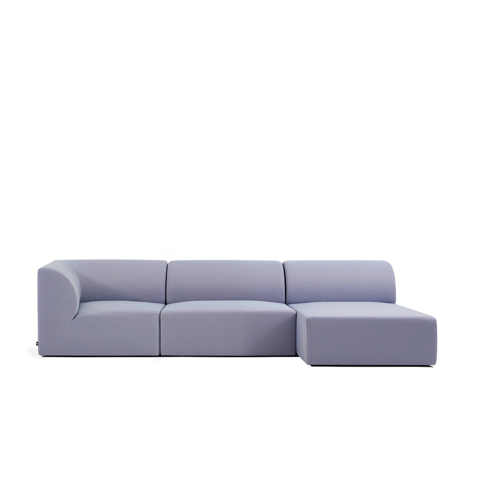 The Weber Modular Sofa by Objekte unserer Tage is an L-shaped, light gray sectional highlighting German craftsmanship with a minimalist design that features clean lines and smooth upholstery.