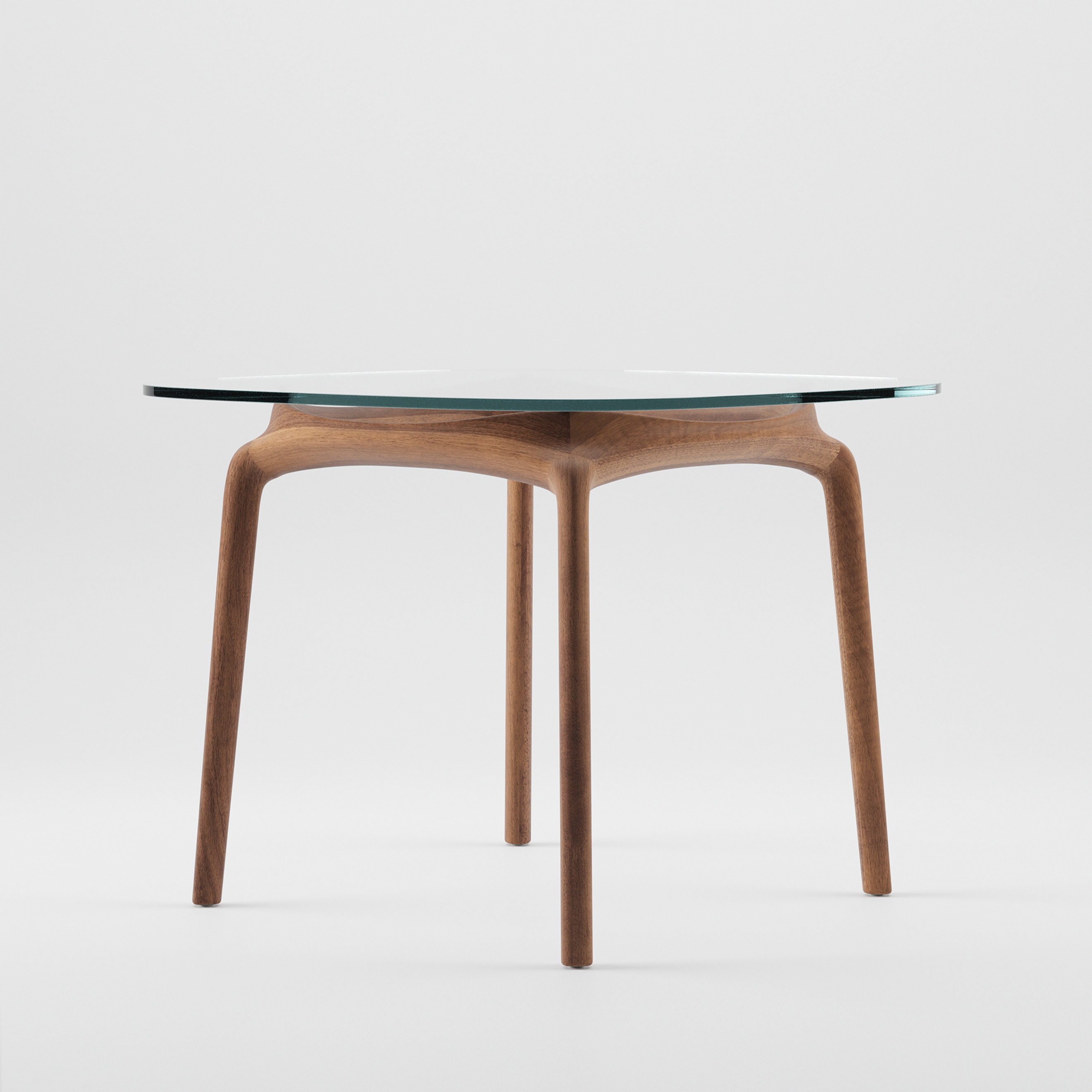 The Artisan PASCAL Square Table showcases a minimalist design with a solid wooden base and sleek, tapering legs that support a clear glass top. Enhanced by natural oils to highlight the wood grain, it stands against a plain white background, exuding an eco-friendly charm.