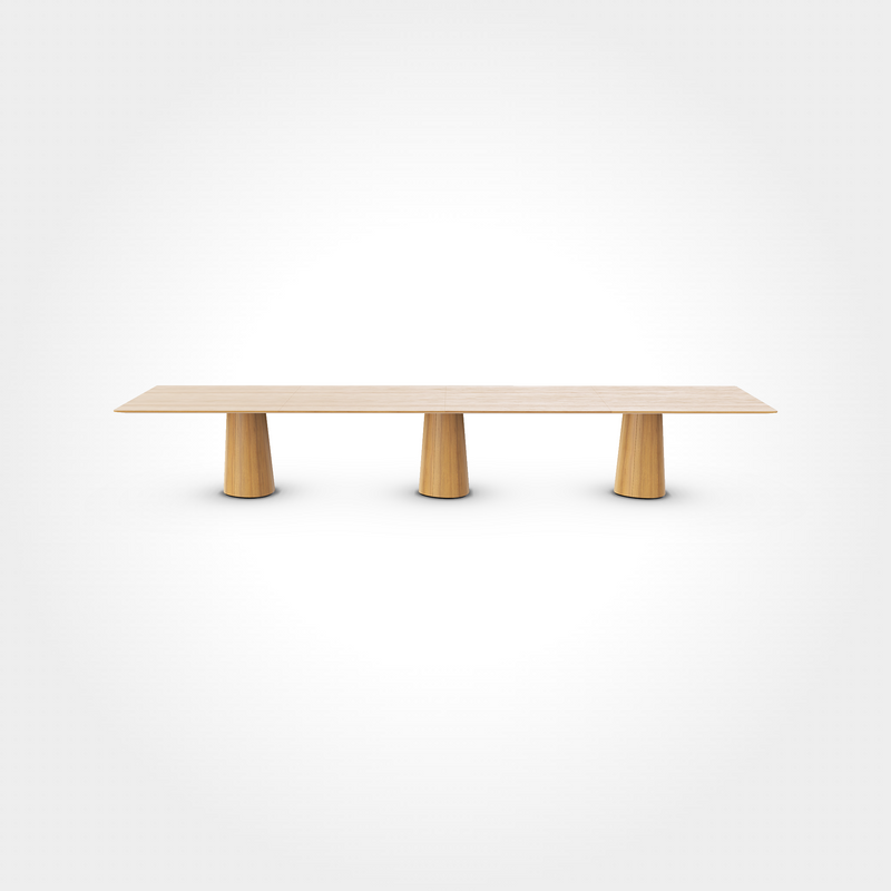 The P.O.V. Plus Table 481 by TON is a minimalist wooden piece with a rectangular top and three cylindrical legs that widen at the base. Its light hue contrasts elegantly against a plain white background, making it ideal for contract, hospitality, office, or dining settings.