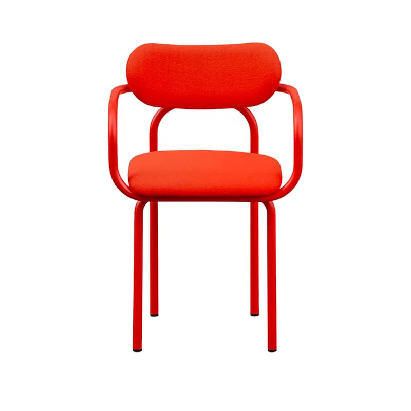 The DOUBLE U arm chair upholstered by Victor Foxtrot showcases wool bouclé upholstery with a rounded backrest and seat cushion on sleek metal legs. The gracefully flared armrests and vibrant red color create a bold, contemporary look, perfect for enhancing any space.