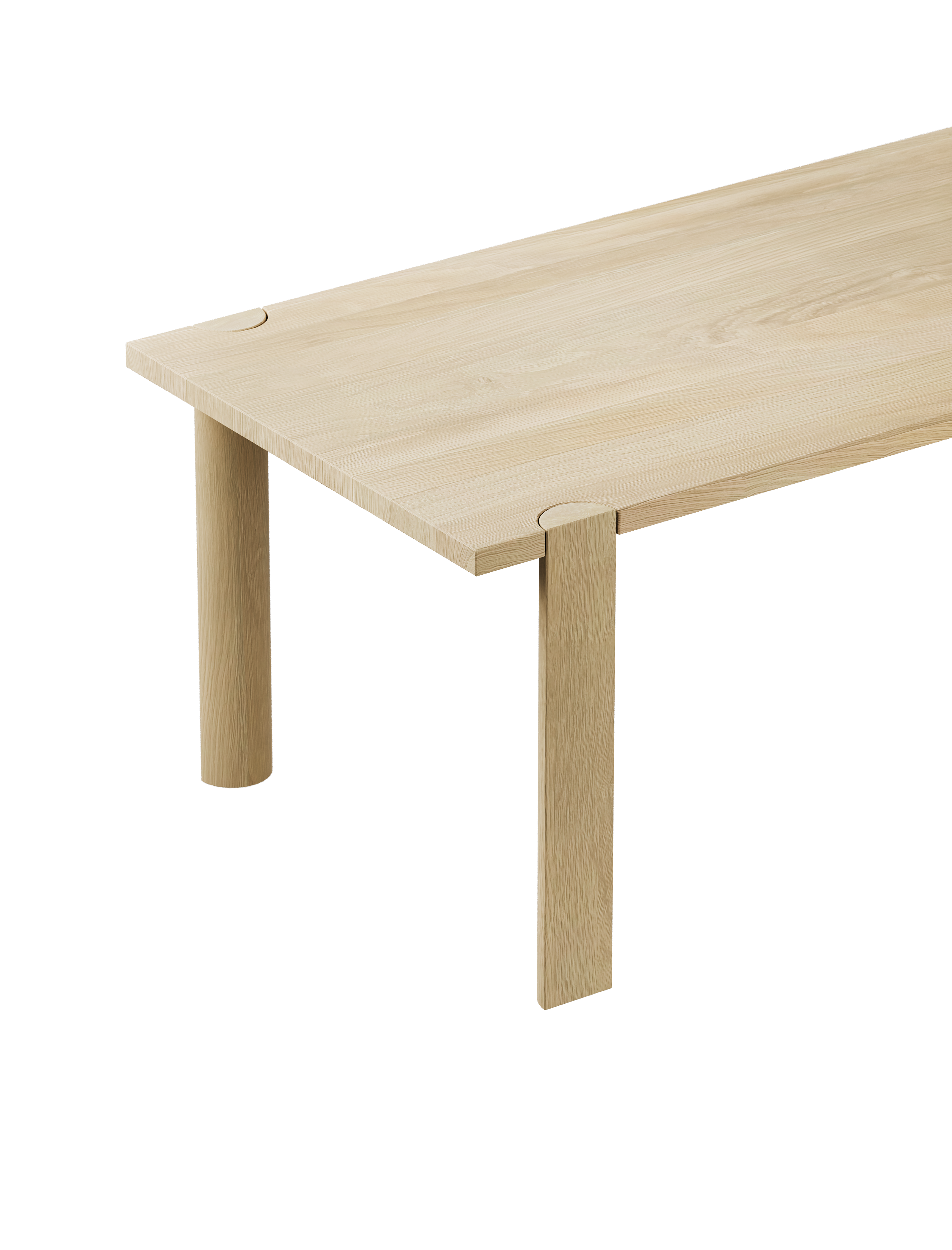 EVERYDAY Table in natural oiled oak with four half-round legs showcasing endgrain on tabletop corner.