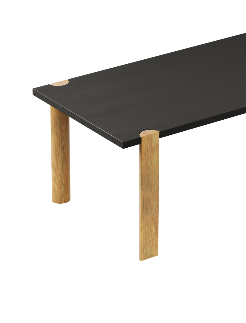 EVERYDAY Table with black tabletop and natural oiled oak half-round legs showing endgrain detail