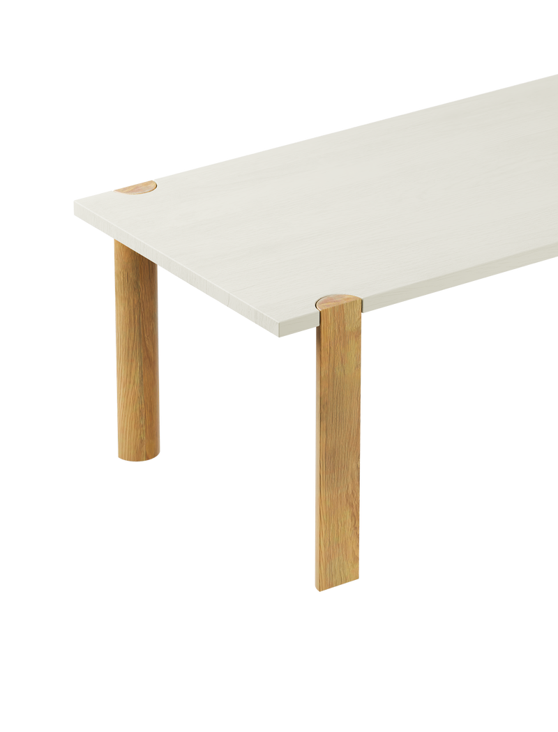 EVERYDAY Table with clean white wood top and natural half-round wooden legs showing endgrain detail.