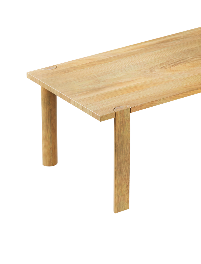 EVERYDAY Table with solid wood tabletop and four half-round legs showing endgrain detail in natural oak finish.