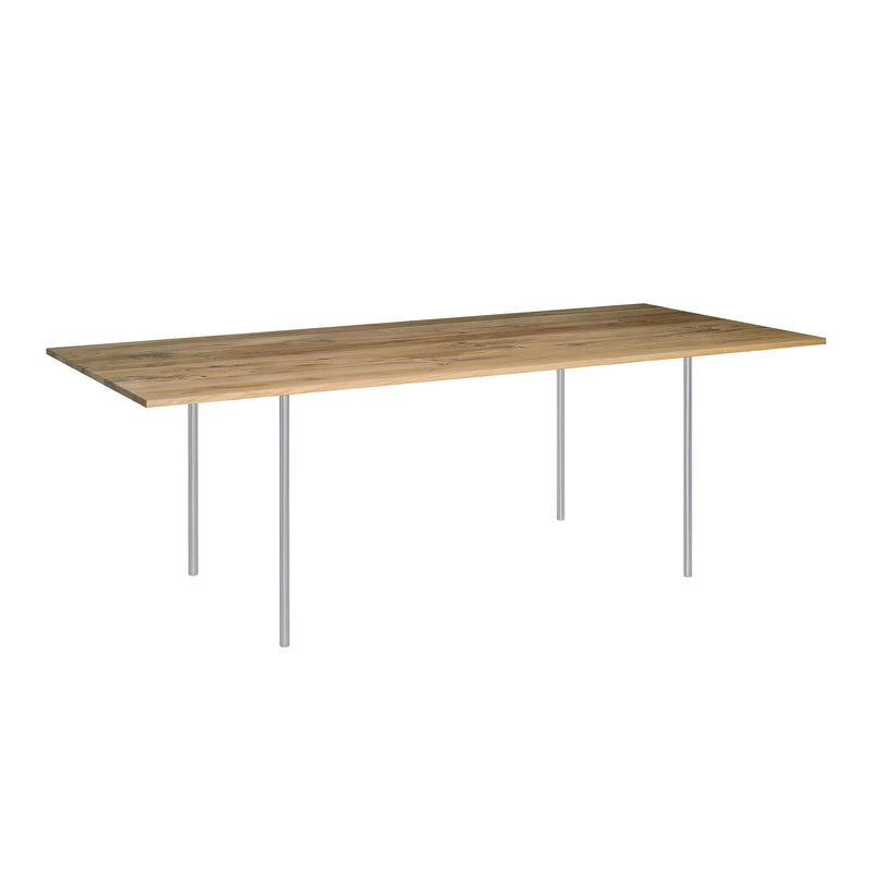The TA14 ANTON by E15 is a modern minimalist dining table with a rectangular walnut tabletop in a light brown tone, supported by four slender steel legs, featuring clean and simple lines for a sleek appearance.