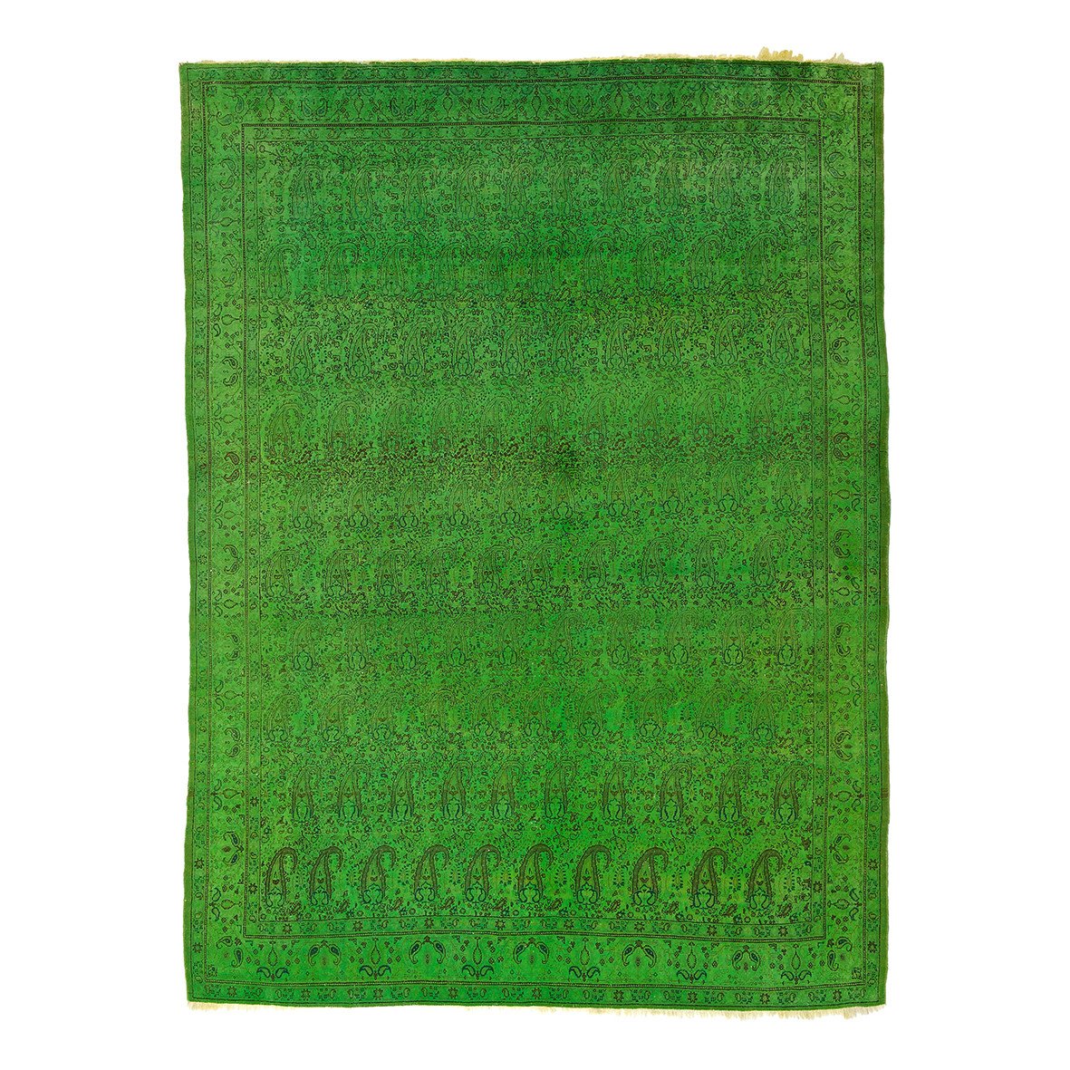 The Color Carpet #1036 by Kiskan is a handmade Persian carpet from the Ghom region, featuring intricate floral and paisley patterns with a green hue. Its geometric and floral border showcases traditional craftsmanship, made of 100% wool for a rich and vibrant texture.