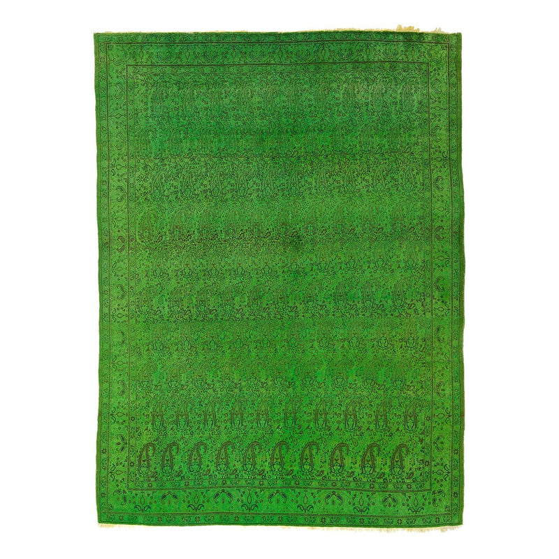 The Color Carpet #1036 by Kiskan is a handmade Persian carpet from the Ghom region, featuring intricate floral and paisley patterns with a green hue. Its geometric and floral border showcases traditional craftsmanship, made of 100% wool for a rich and vibrant texture.