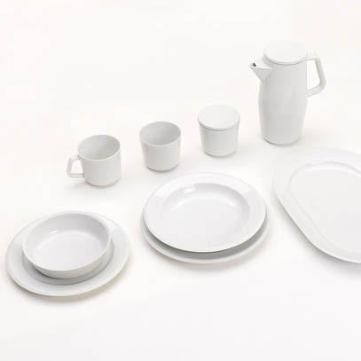 The Augarten Orbit Collection - Sale by Augarten showcases a minimalist set of white porcelain tableware, including plates, bowls, cups, a creamer, and a lidded jar. This organized display features rotational shapes and semi-matt polished rims on a white surface.