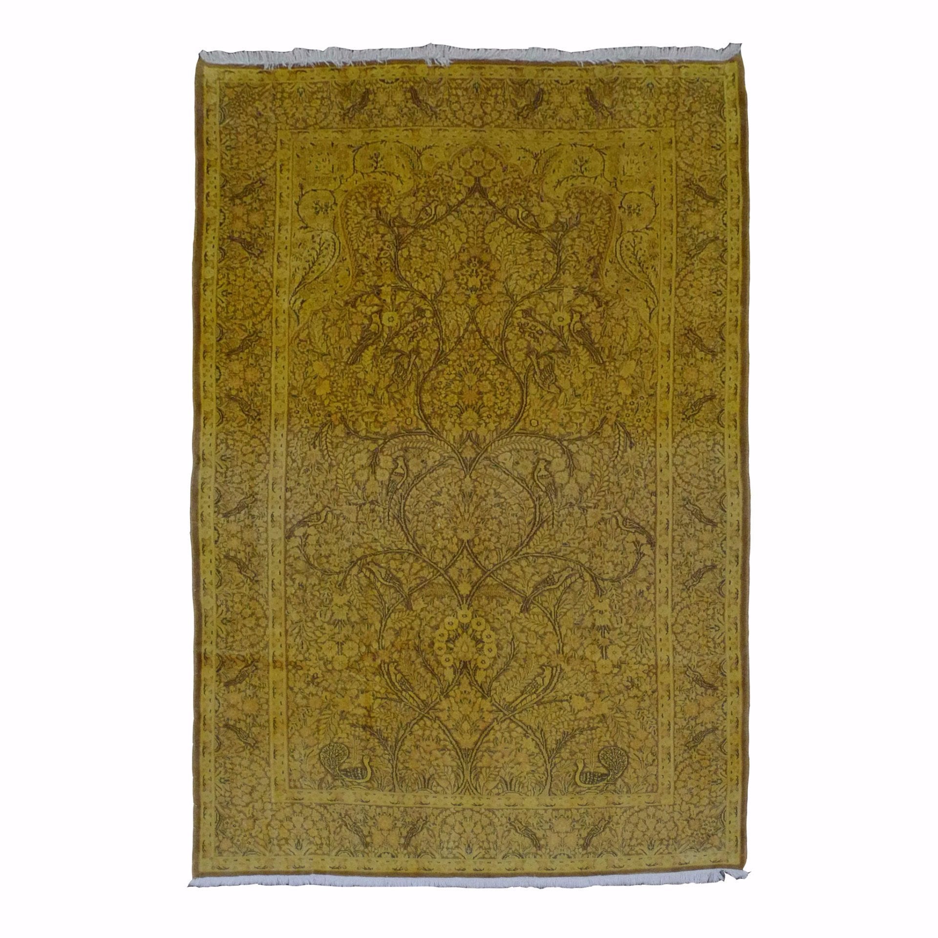 The Color Carpet #357 by Kiskan is a rectangular, intricately patterned gold-and-brown rug made in Kerman. It features a symmetrical floral design with a decorative border, crafted from 100% wool for a vintage look and charmingly frayed edges, embodying the elegance of handmade Persian carpets.