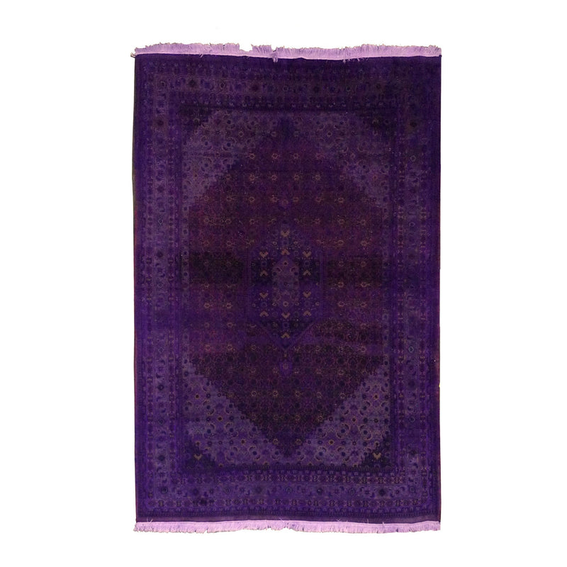 The Kiskan Color Carpet #382 - Sale is a richly patterned, deep purple oriental rug made from 100% wool. Featuring intricate dark motifs on a faded background with a central diamond shape and fringed edges, it exudes the timeless allure of vintage handmade carpets.