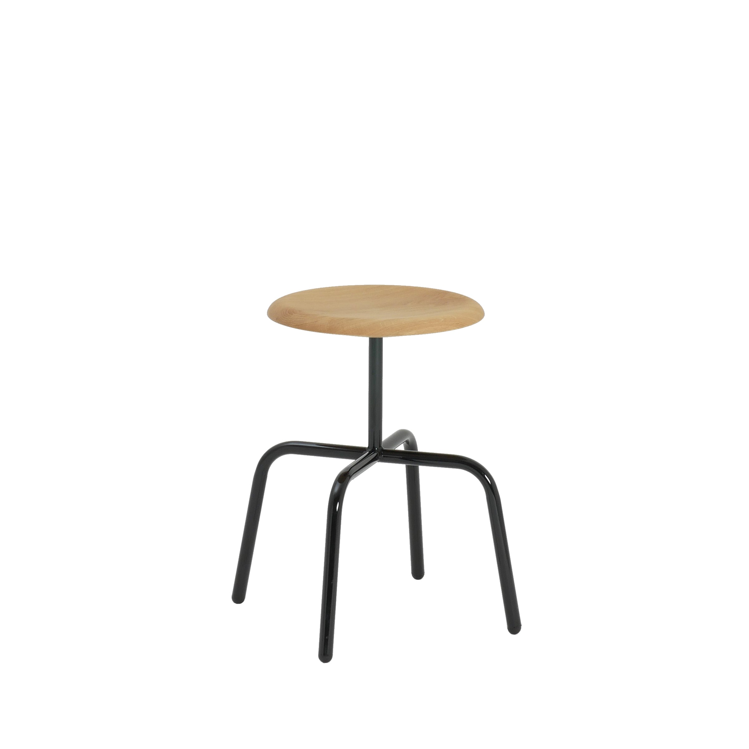 The Herrenberger Stool by Atelier Haussmann offers a round wooden seat on a sleek, black tubular steel frame. Its minimalist, industrial design pops against a white backdrop, showcasing slightly bent legs for enhanced stability and modern charm.