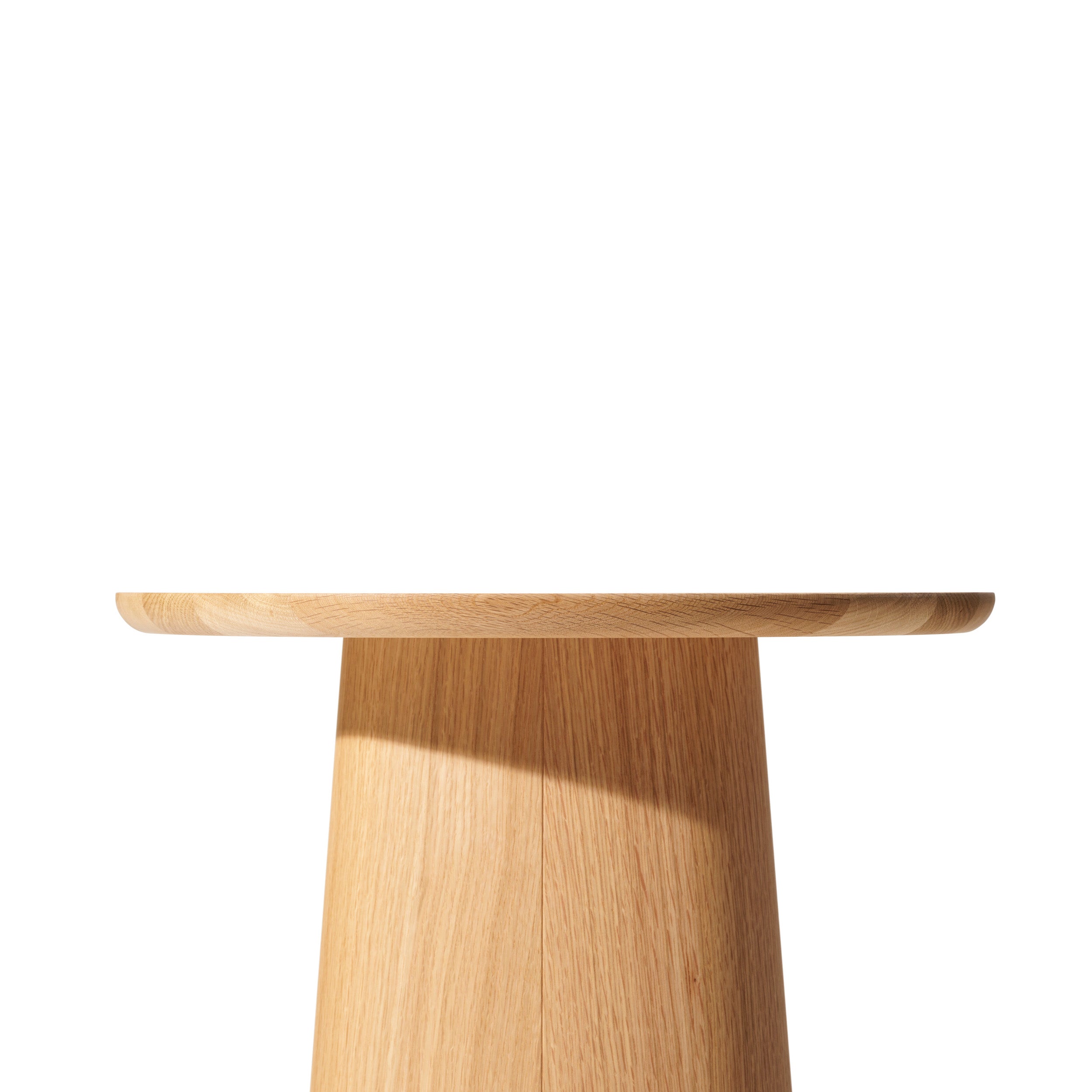TONs P.O.V. Coffee Table 473 is set against a white background, showcasing its minimalist design. It features an organic aesthetic with a circular wooden top and tapered cylindrical base, all in a light, natural wood finish.