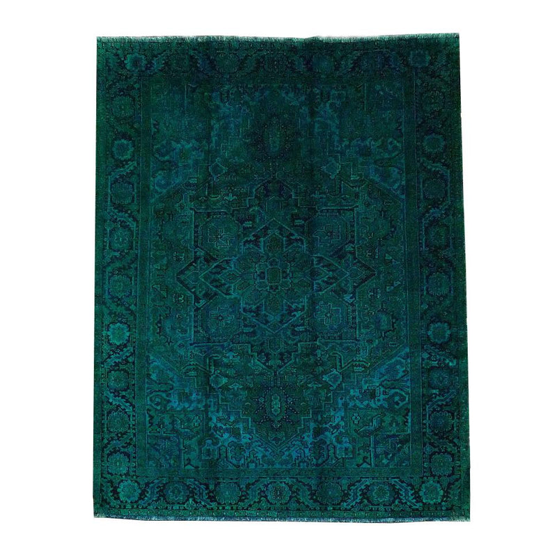 The Color Carpet #522 - Sale by Kiskan is a rectangular blue-green patterned Täbriz rug featuring a central medallion and detailed floral motifs. Handmade from 100% wool, it offers a soft texture, symmetrical pattern, and geometric border.
