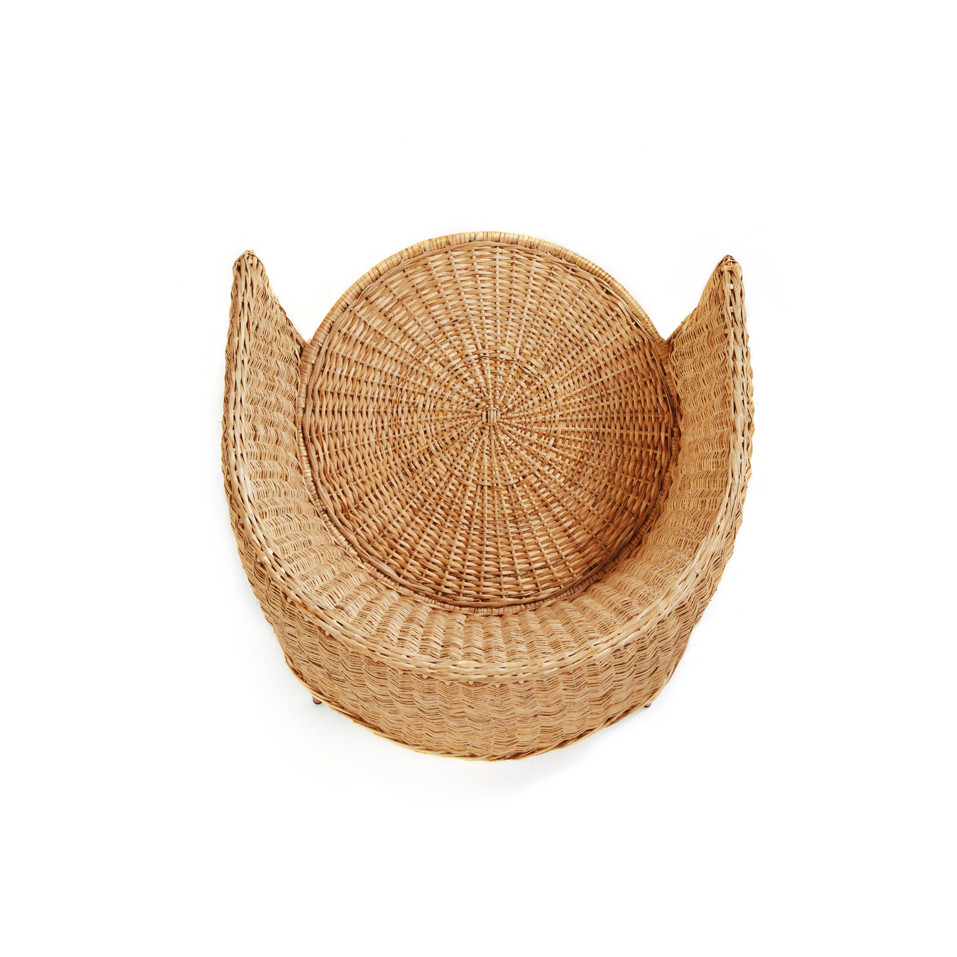 The Ames Caribe Natural Lounge Chair by Ames—a round, woven wicker seat with a high, curved back and sides—is shown from above on a white background.