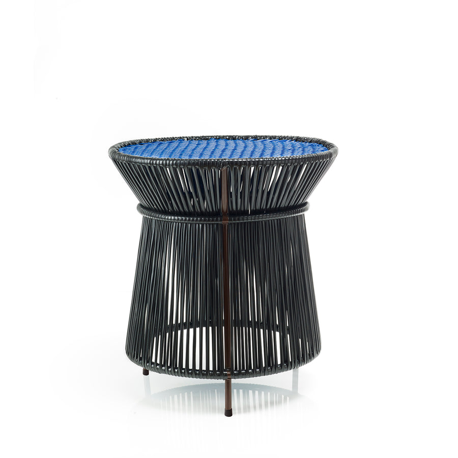 The Ames Caribe High Table by Ames, from the Caribe Collection, features a black metal base with vertical rods and a flat blue woven top—perfect as modern outdoor furniture. Shown photographed against a plain white background.
