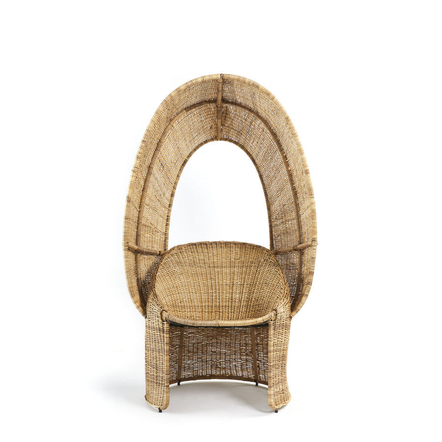 The Ames Cartagenas Natural Reina Chair by Ames features a woven rattan design with a wide, rounded backrest and curved seat, inspired by Cartagena’s furniture, shown from the front against a plain white background.