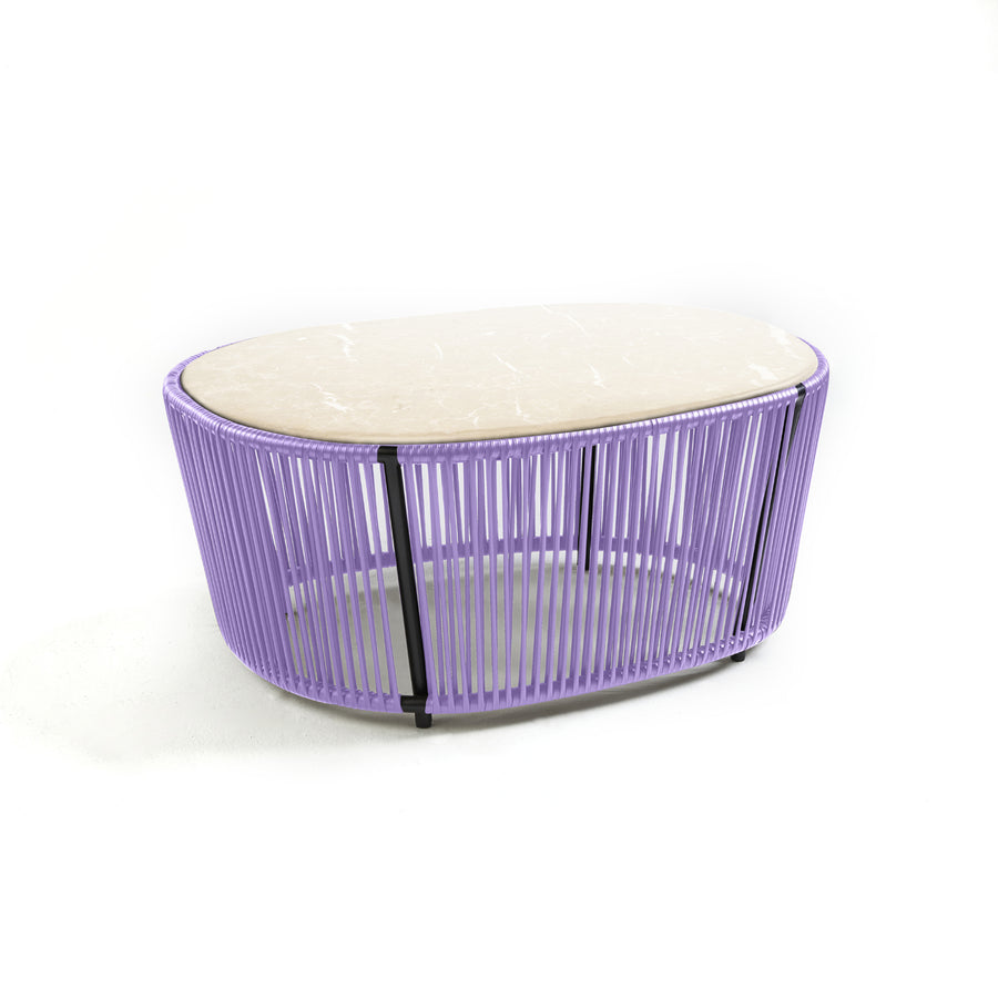 The Ames Cartagenas Coffee Table by Ames showcases a beige oval stone top and a purple metal wire base, displayed on a plain white background.