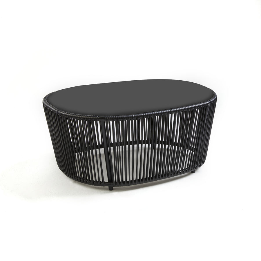 The Ames Cartagenas Coffee Table by Ames is a sleek black table that comes with a matching black cushion.