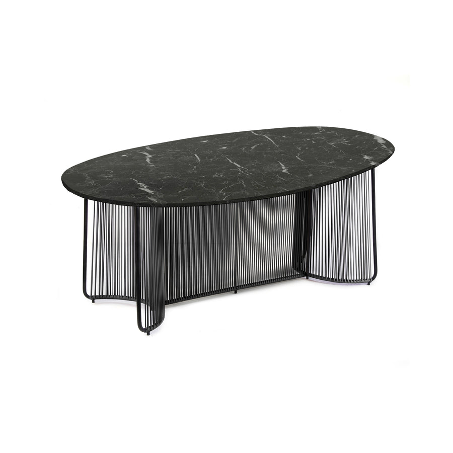 The Ames Cartagenas Dining Table by Ames features a sleek tabletop and modern metal base, inspired by Sebastian Herkner’s iconic style. Its open, airy design stands out beautifully against a plain white background.