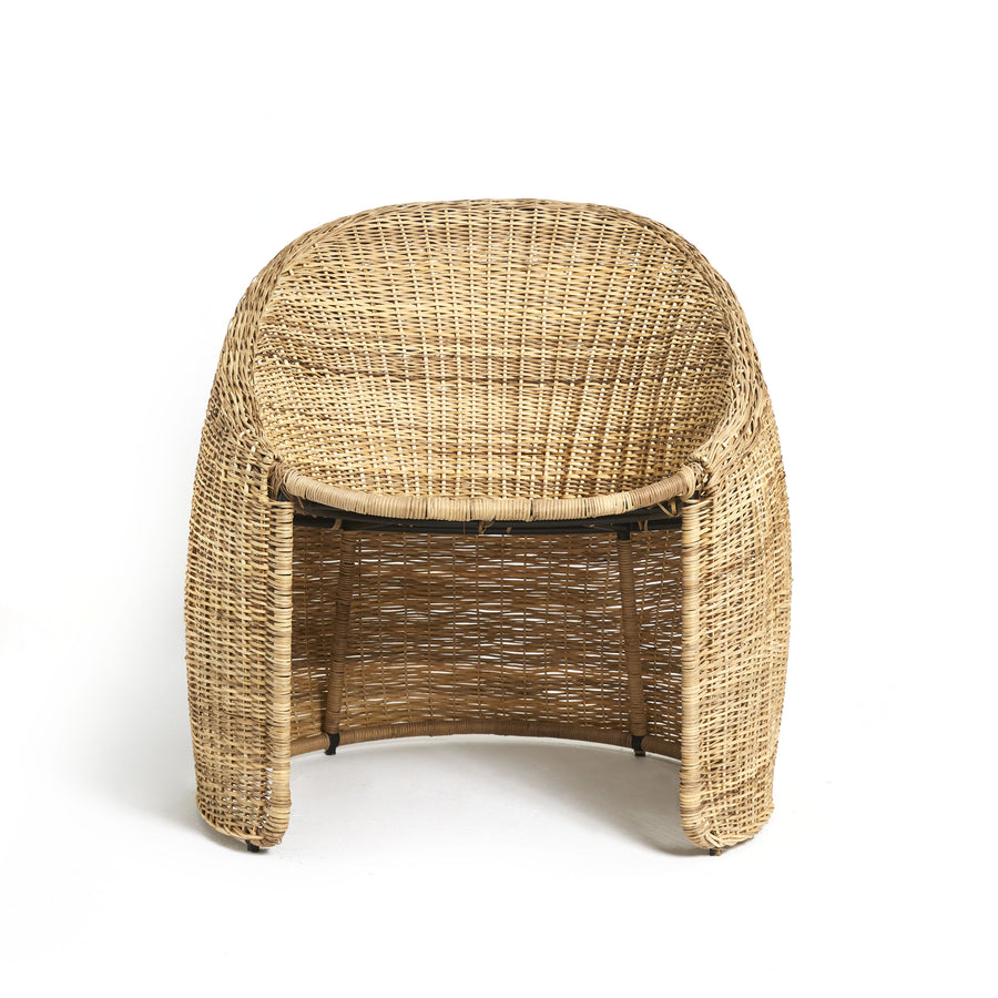 The Cartagenas Natural Lounge Chair by Ames, with its open weave design and rounded back in a natural color, showcases elegant craftsmanship reminiscent of Cartagenas furniture, set against a plain white background.