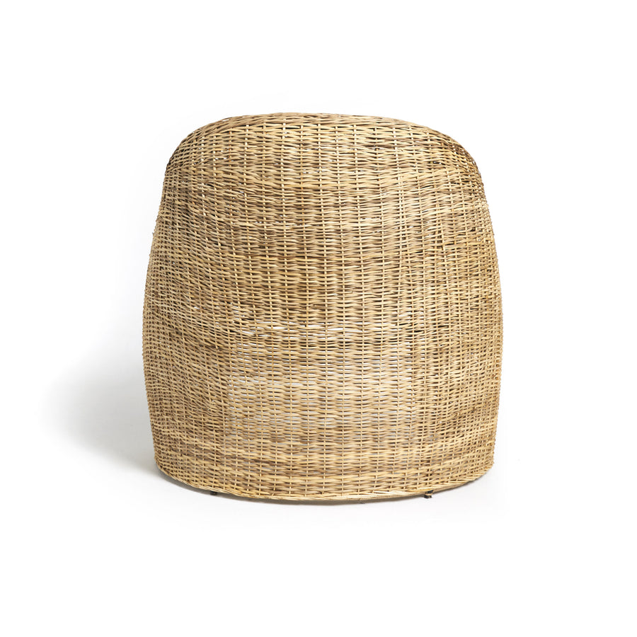 A cylindrical woven wicker basket with a rounded top, reminiscent of the elegant Ames craftsmanship used in the Cartagenas Natural Lounge Chair, is placed on a plain white background.
