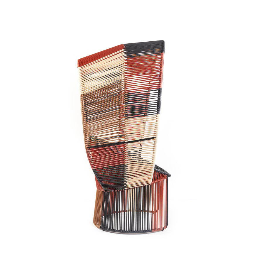 The Cartagenas Reina Chair Limited Edition by Ames enhances any outdoor space with its modern geometric design. It features a unique woven texture and crisscrossing colored bands in red, orange, beige, black, and brown, highlighting its angular form.
