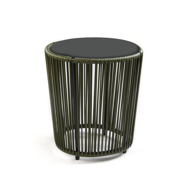 The Cartagenas Sidetable by Ames, designed by Sebastian Herkner, features a black top and an olive green, slatted cylindrical base with evenly spaced vertical rods for an airy and modern look inspired by a lively coastal metropolis.