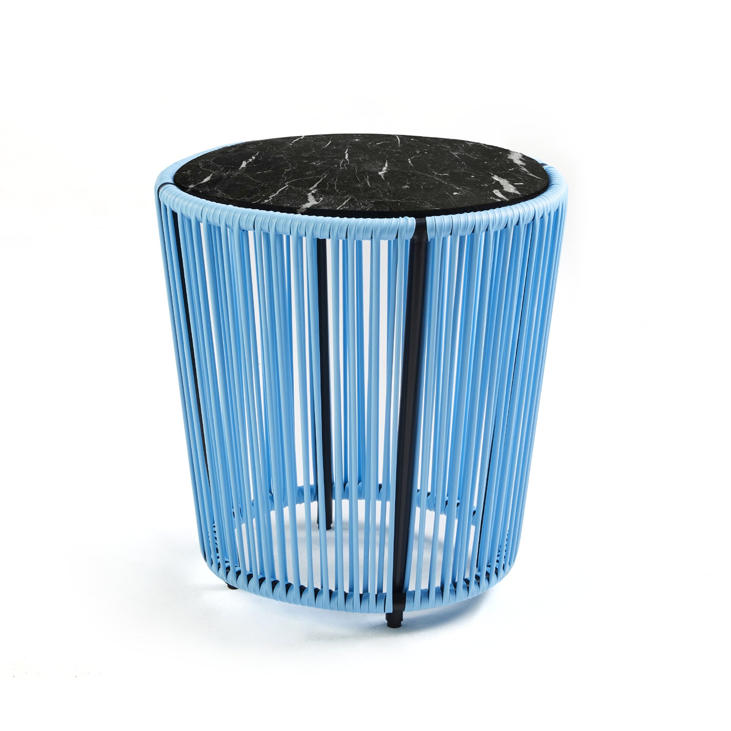 Introducing the Cartagenas Sidetable by Ames, inspired by Sebastian Herkners designs. This modern piece combines a round black marble top with a cylindrical base of vertical blue metal rods, blending industrial and sleek elements for a contemporary look.