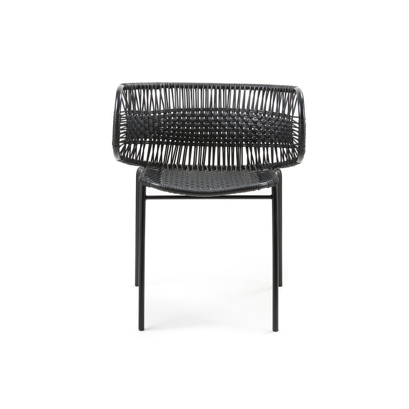 Introducing the Cielo Armchair by Ames—a versatile outdoor chair featuring a minimalist design with traditional black weaving on a simple metal frame. Photographed against a plain white background, it exudes timeless elegance.