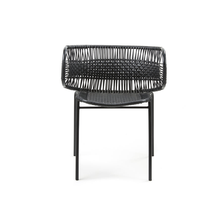Introducing the Cielo Armchair by Ames—a versatile outdoor chair featuring a minimalist design with traditional black weaving on a simple metal frame. Photographed against a plain white background, it exudes timeless elegance.