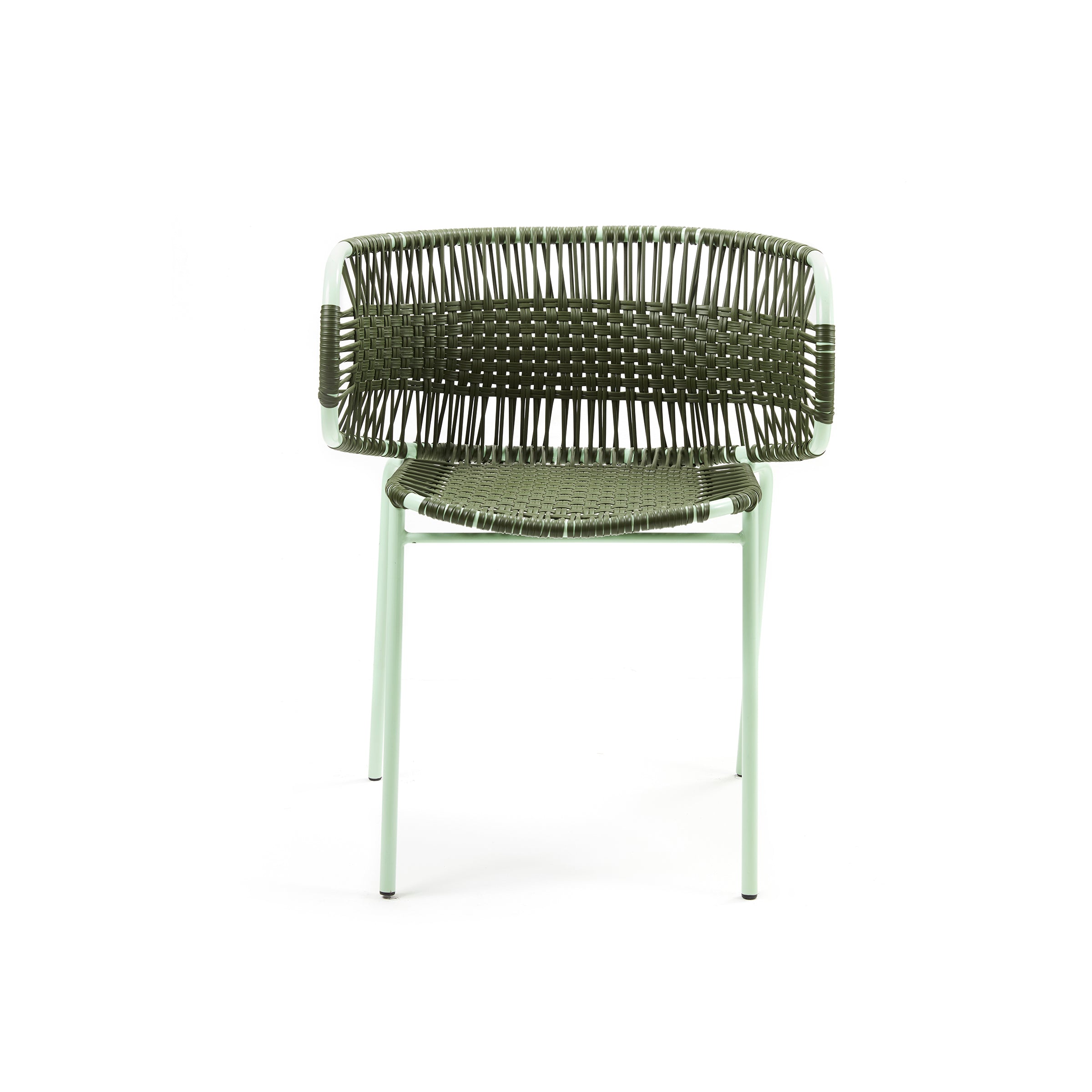 The Cielo Armchair by Ames is a versatile outdoor chair featuring a woven back and seat with traditional techniques, complemented by sleek pale green metal legs and armrests. Perfect for indoor and outdoor use, it adds texture and style to any space.