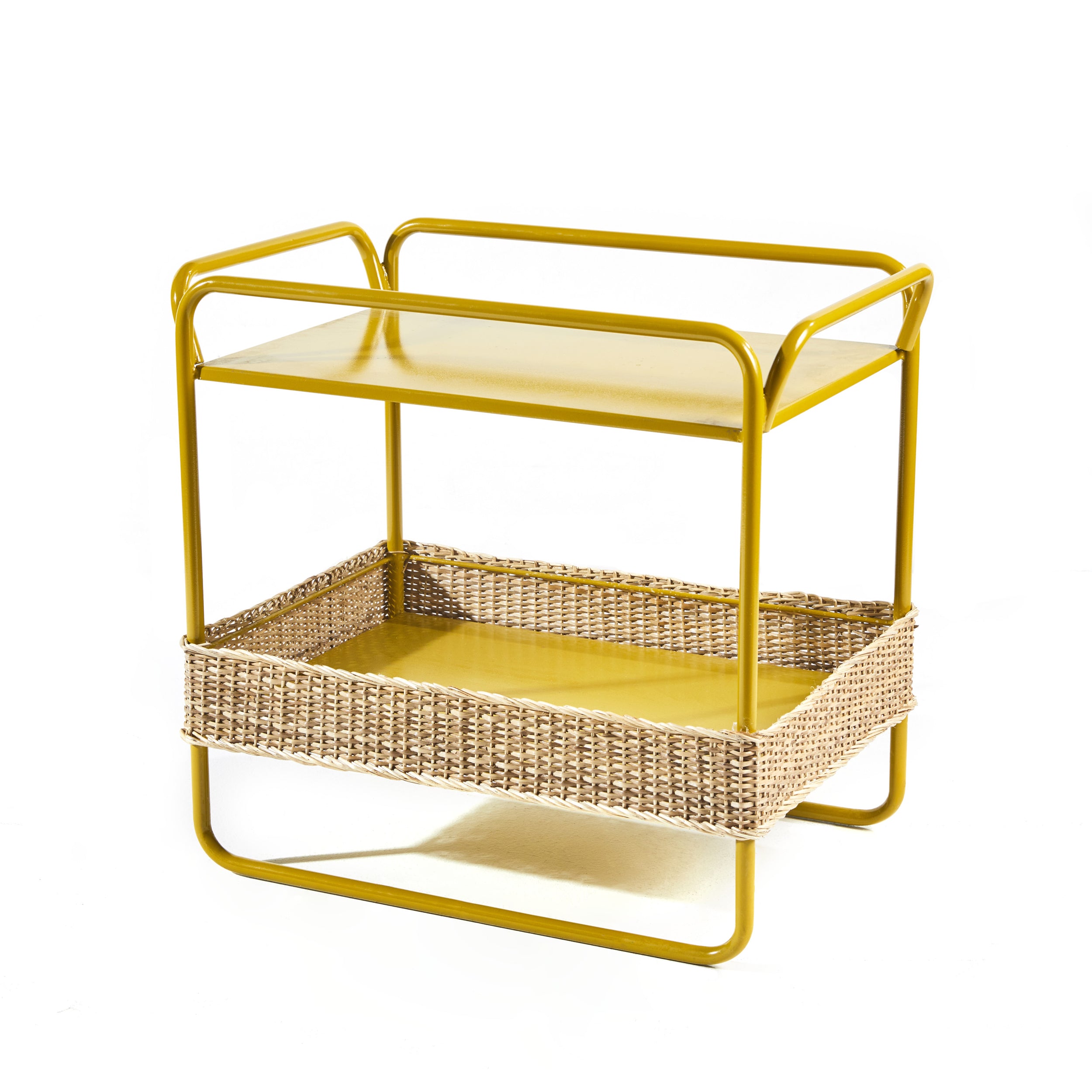 Yellow two-tier cart featuring a top shelf and lower woven basket of recycled plastic. Rounded metal handles and frame showcase modern design, perfectly complementing the Ames Dichas Sidetable style.