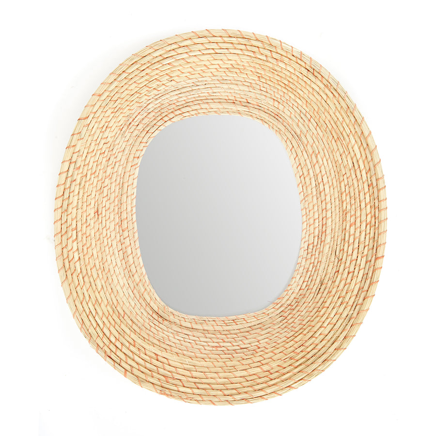 The Ames Killa Mirror by Ames is a handmade round wall mirror featuring a wide, woven Iraca palm rattan frame in natural beige tones, shown against a white background.