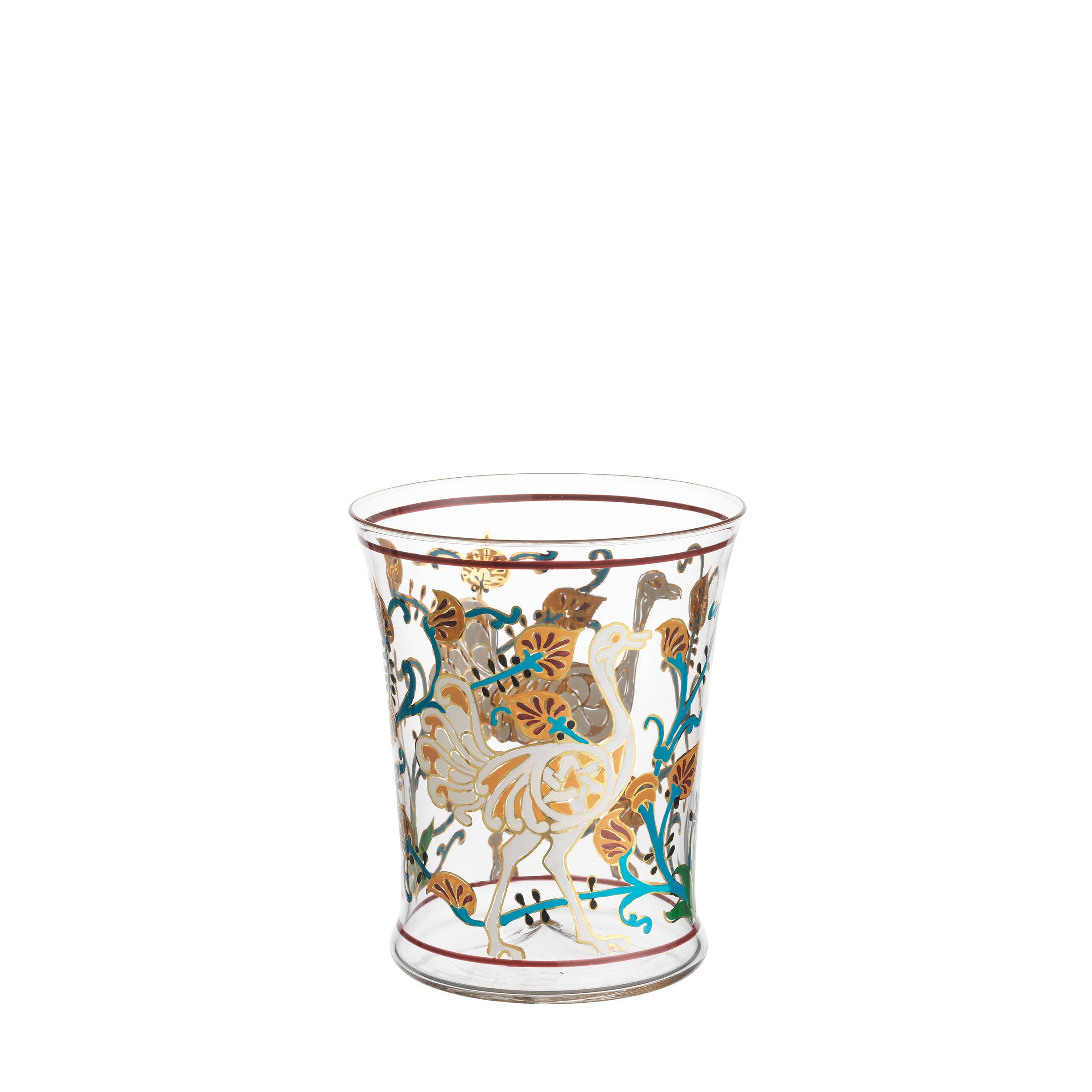 The Alhambra Tumbler by Lobmeyr showcases intricate gold and multicolored floral and bird designs. Inspired by Franz Schmoranz, this hand-painted crystal glass features detailed leaves and blossoms with elegant birds, creating a vintage, ornate aesthetic.