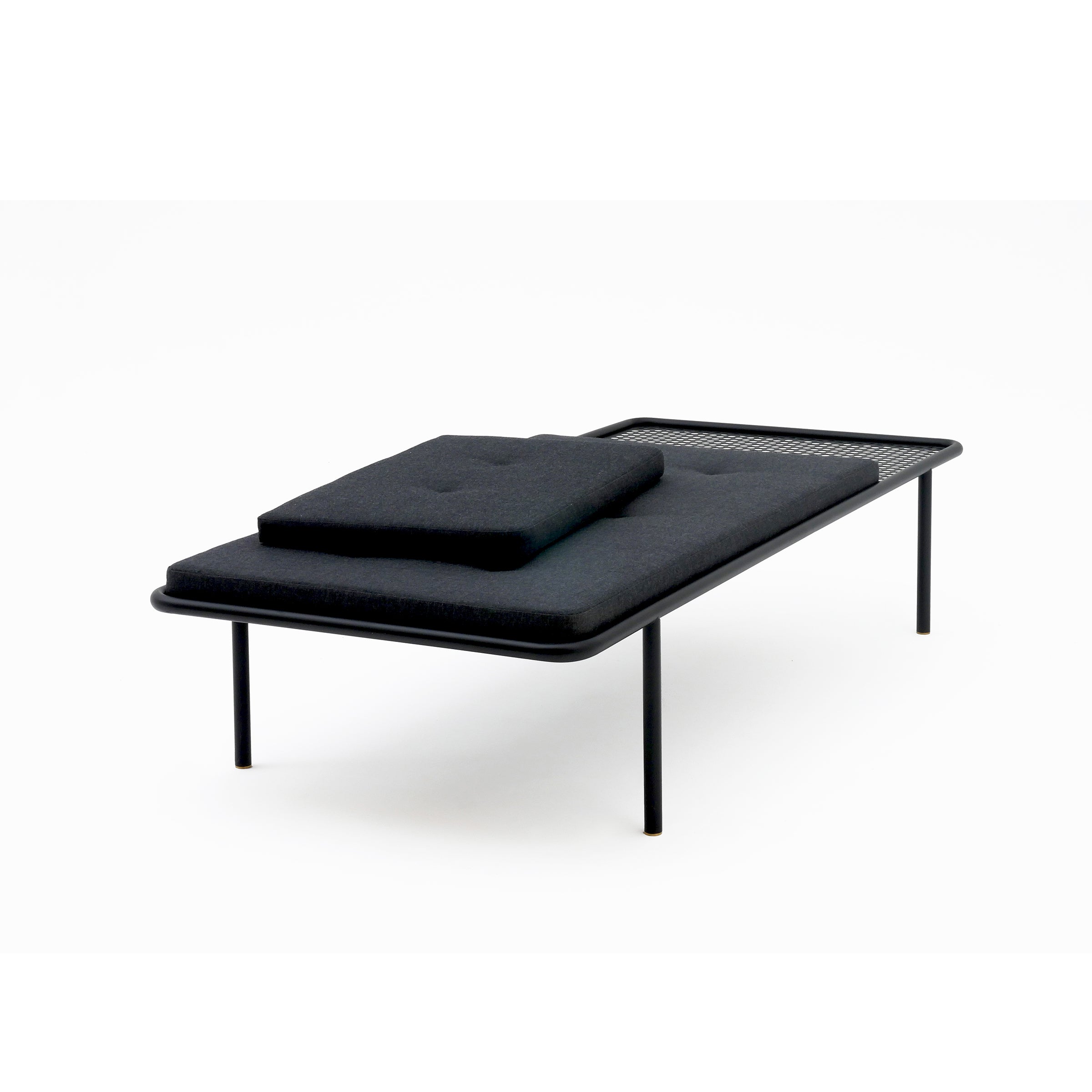 2PM Day & Night Daybed featuring black mattress on minimalist steel frame with industrial-style perforated sheet base