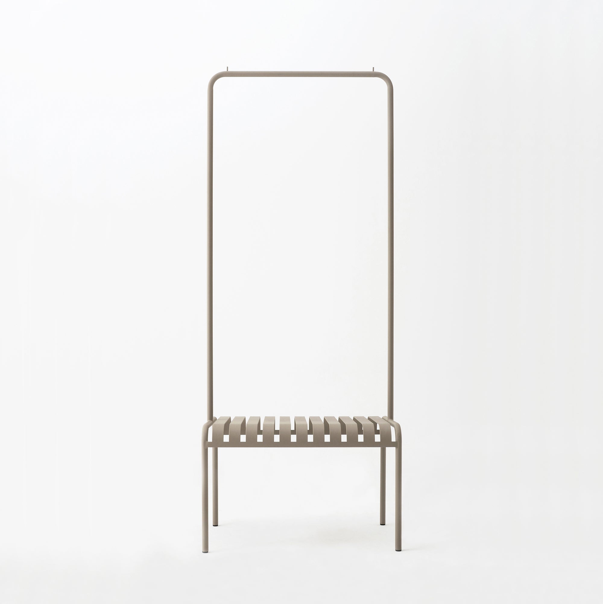 A minimalist chair with a slatted seat and tall rectangular backrest is made of light brown powder-coated steel against a white background, echoing the elegance of Atelier Haussmanns Coatstand YOUTOO in blending form and function.