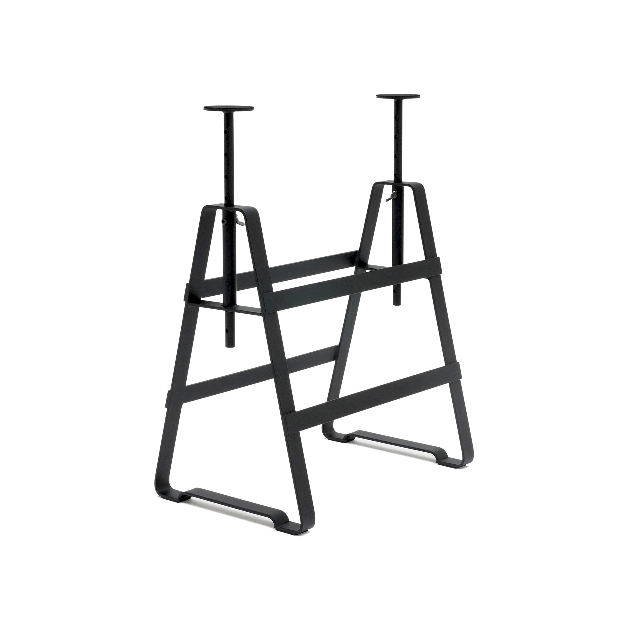 Introducing the Lackaffe Trestle by Atelier Haussmann: a black adjustable metal sawhorse crafted from powder-coated steel with a sturdy rectangular frame, height-adjustable trestle legs, and multiple crossbars, perfect for any construction or workshop task.