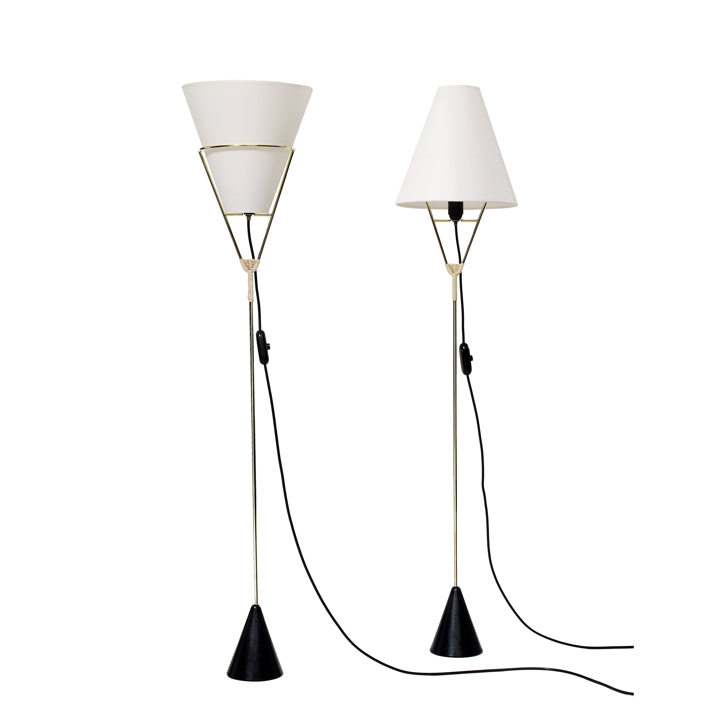 The sleek Floorlamp Vice Versa #4105-3 by Werkstätte Carl Auböck features white conical shades, slender stands, and black cone bases with cords, merging minimalist Viennese townhouse elegance and contemporary functionality.