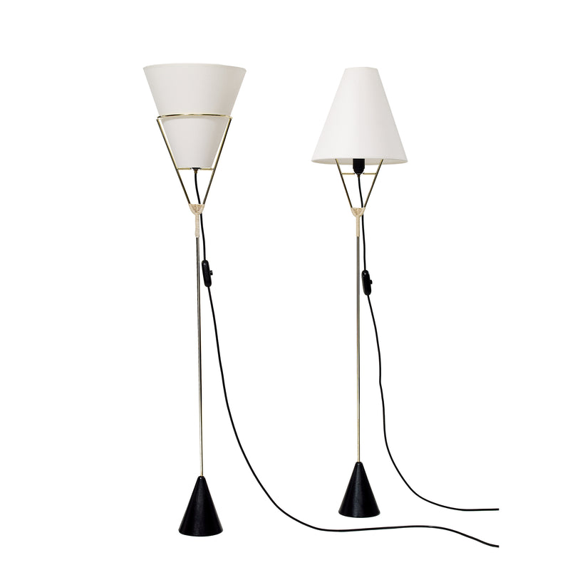 The sleek Floorlamp Vice Versa #4105-3 by Werkstätte Carl Auböck features white conical shades, slender stands, and black cone bases with cords, merging minimalist Viennese townhouse elegance and contemporary functionality.