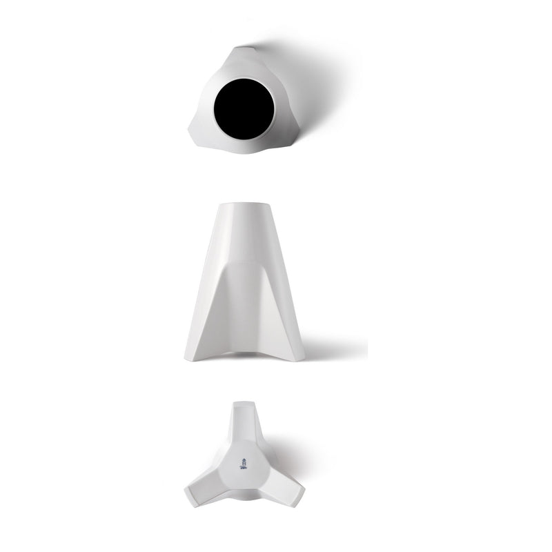 The Augarten Rocket Vase, currently on sale, is a minimalist piece with a modern design. Displayed from three angles on a white background, the top view is reminiscent of Thomas Feichtners works with its round form; the side reveals a sleek triangular shape; and the bottom shows a three-pointed star base.