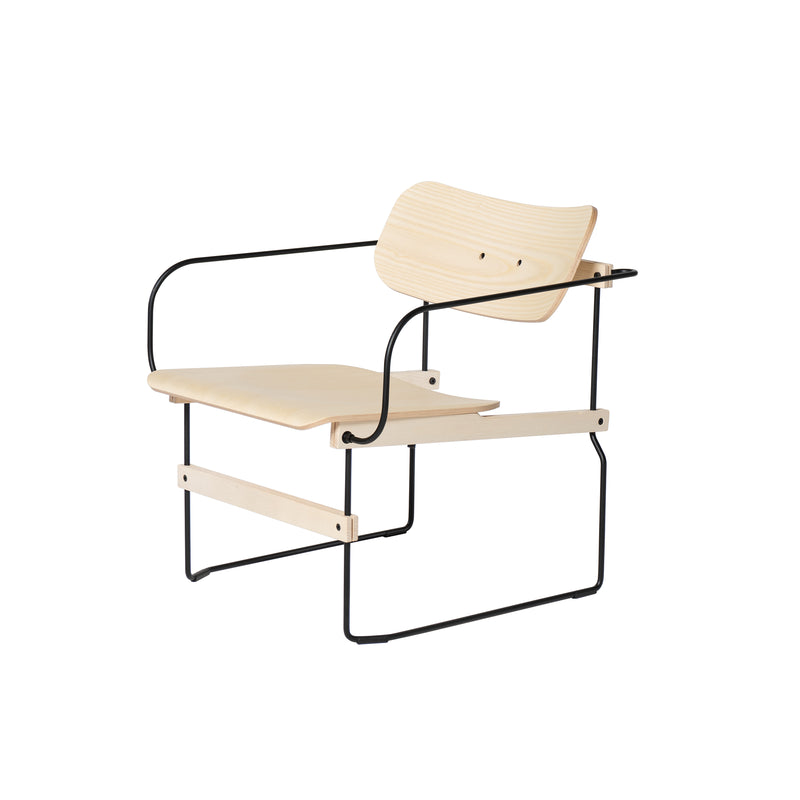 Moormanns Brutissimo is a modern minimalist wooden lounge chair featuring a light birch wood seat and backrest. It has a black steel wire frame forming the arms and legs, offering a sleek, contemporary look.