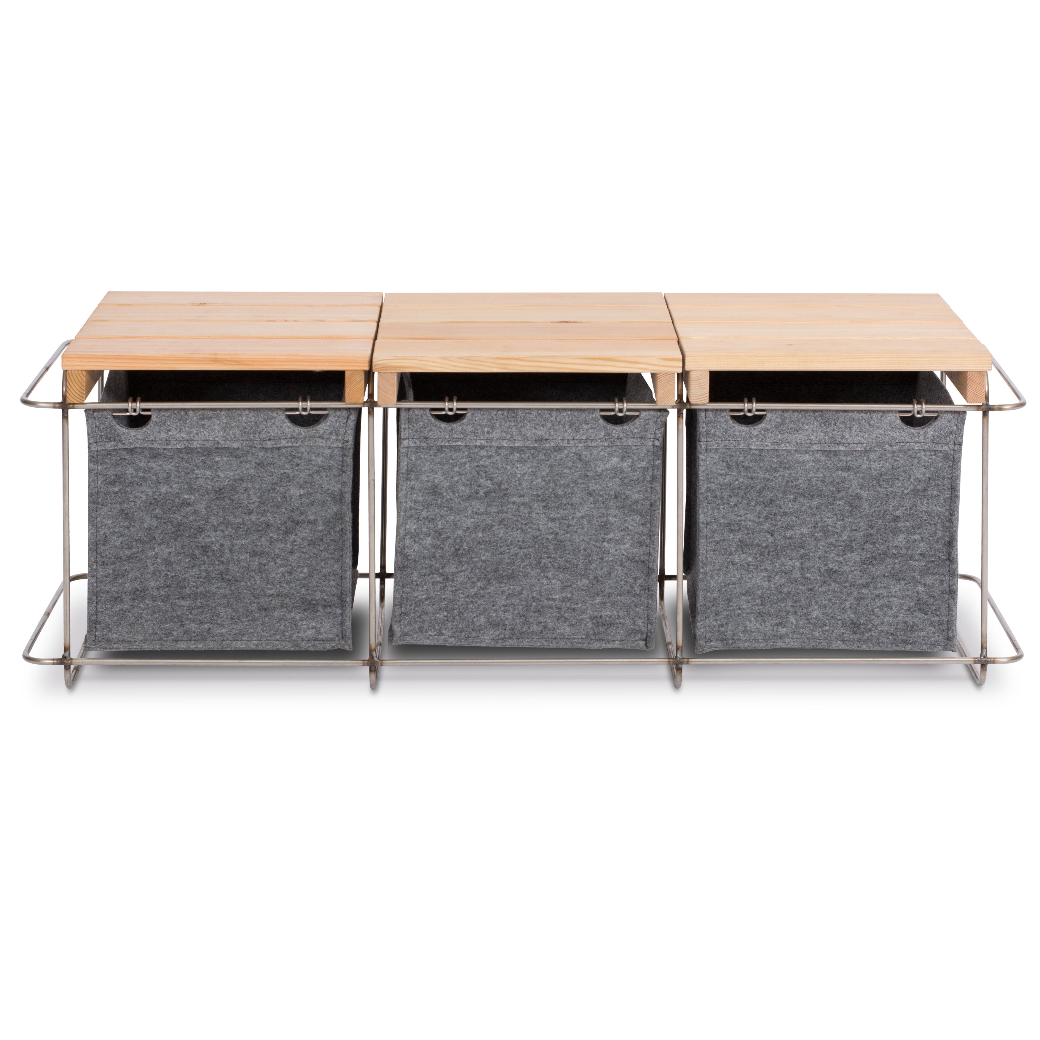 Three Grit Outdoor gray storage bins by Bartmann Berlin offer versatile functionality with metal frames, fabric compartments, and seamless wooden tops. This modular system is perfect for organization, storage, or customizable seating arrangements.